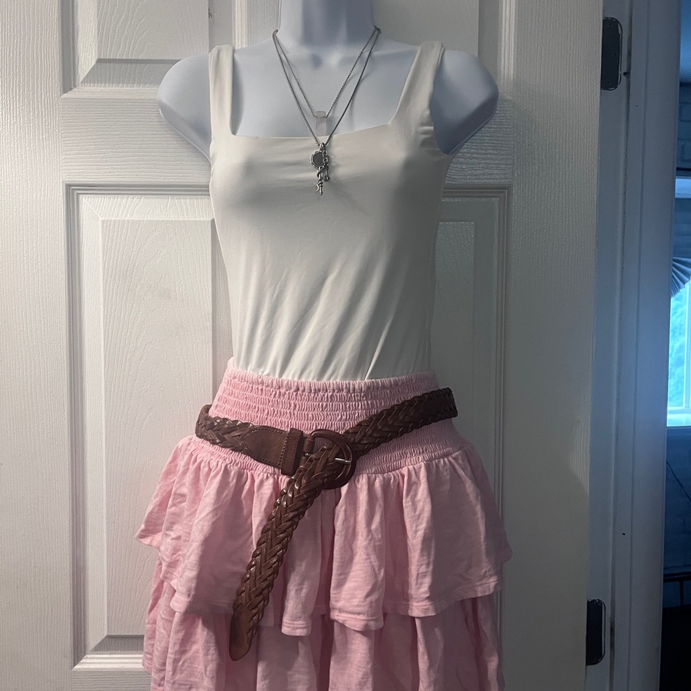 Chic Pink Layered Skirt with white body suit and belt sold separately 
So cute